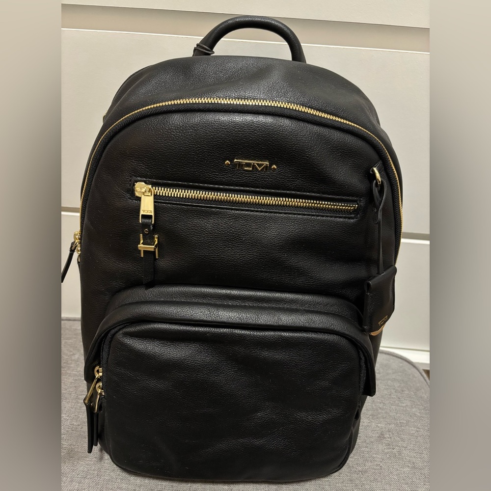 Tumi Black Leather Backpack with Gold Details